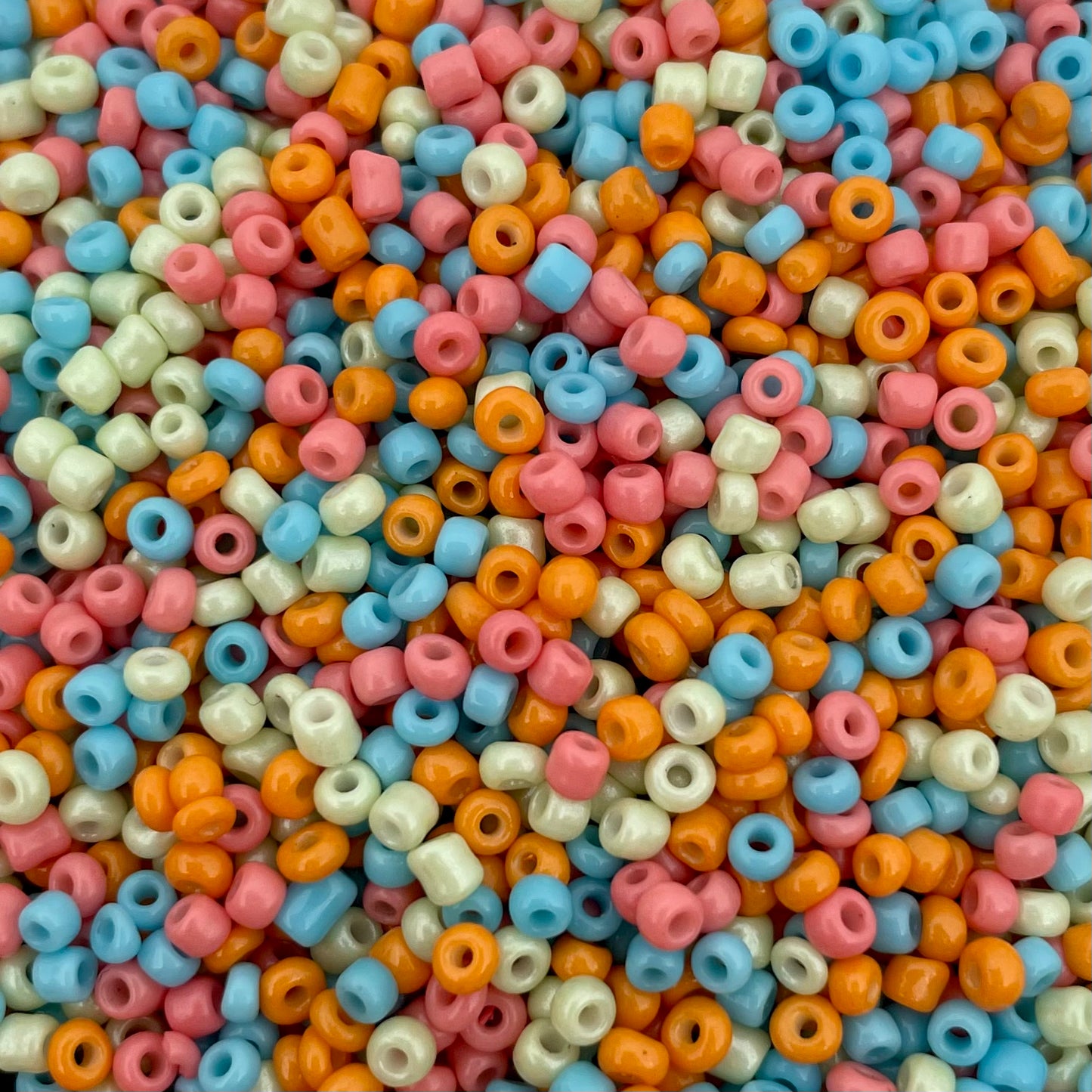 7gram Rocailles kralenmix oranje blauw rood - 2mm