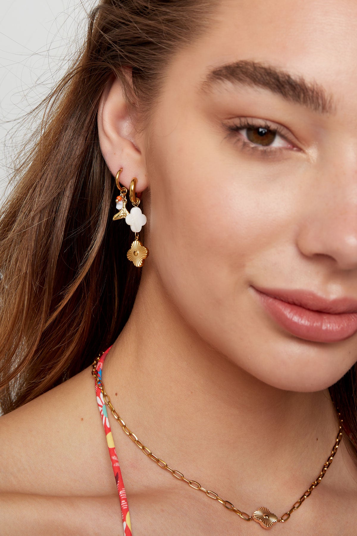 Oorbellen met bedel party - goud RVS