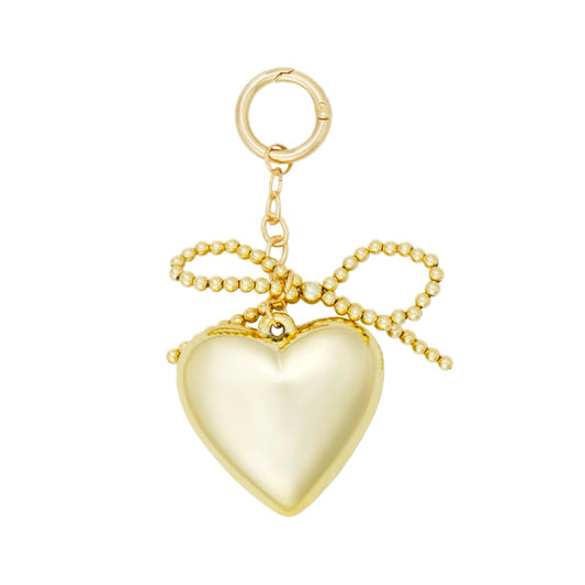 (per stuk) Bag charm strik met hart goud - 11x5,5cm