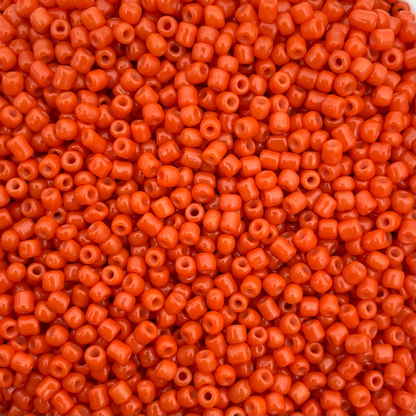 7gram Rocailles kralen oranjerood - 2mm