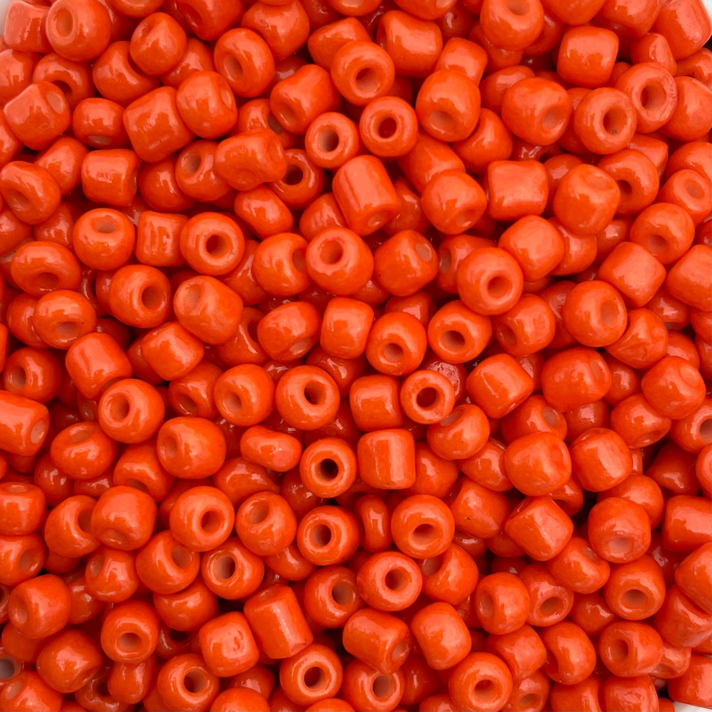 7gram Rocailles kralen oranjerood - 4mm