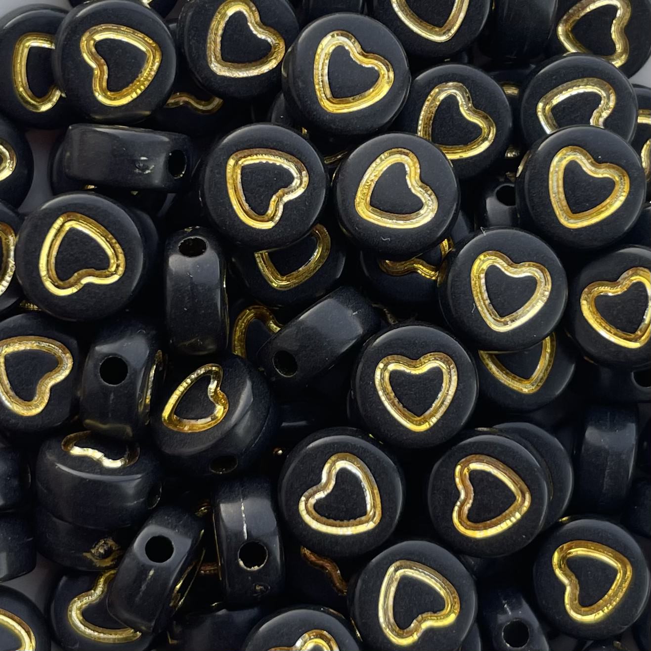 5 stuks Hartjes kralen goud met zwart - 7mm