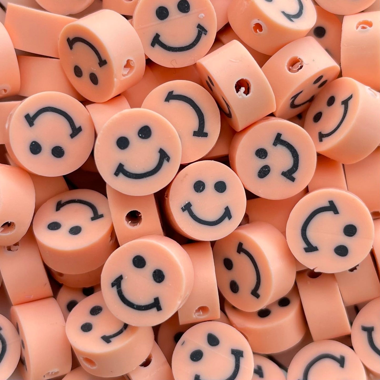 5 stuks Polymeer smiley kraal pastel oranje - 10mm