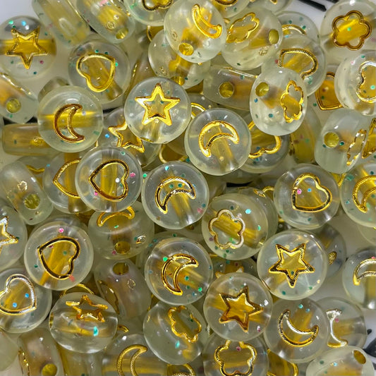 5 stuks Figuur kralen goud transparant met glitter - 7mm